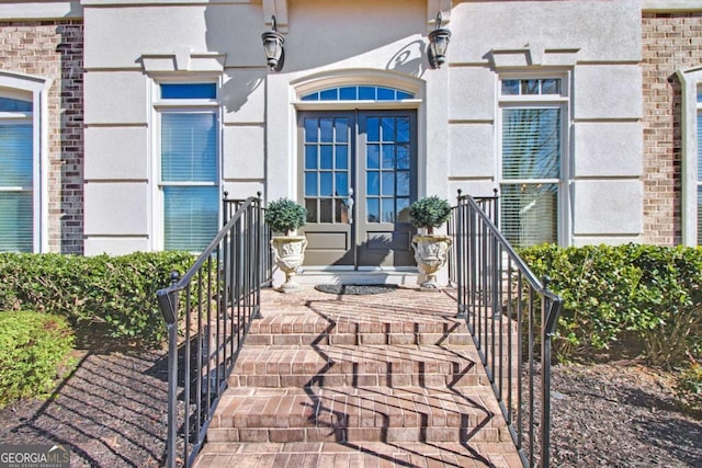 doorway to property featuring french doors