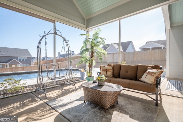 sunroom with vaulted ceiling