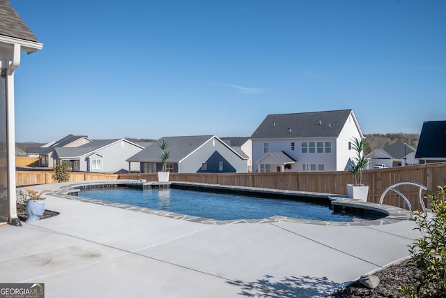 view of pool featuring a patio and pool water feature