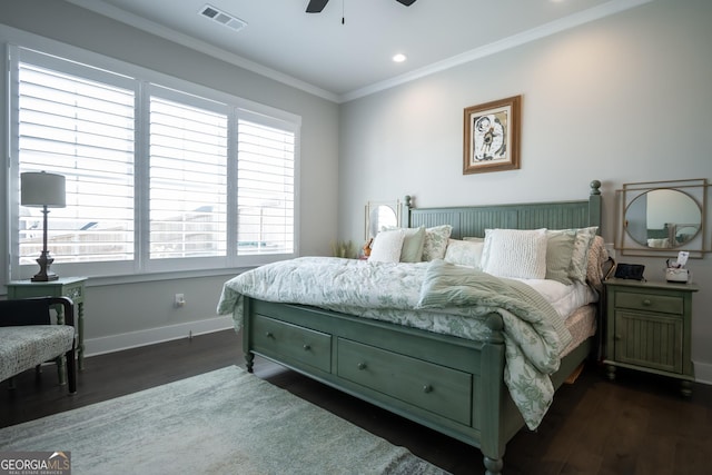 bedroom with ceiling fan, ornamental molding, and dark hardwood / wood-style floors