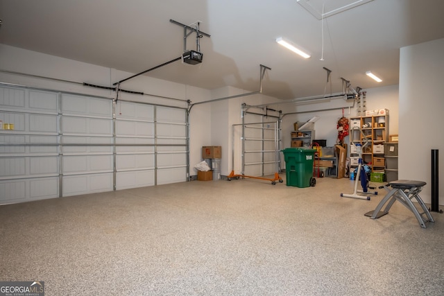 garage featuring a garage door opener