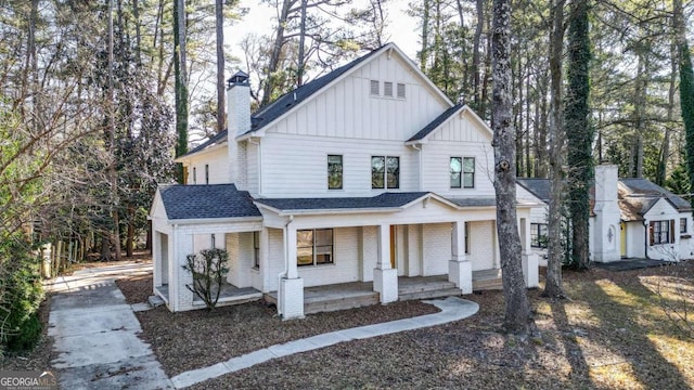 modern inspired farmhouse with covered porch