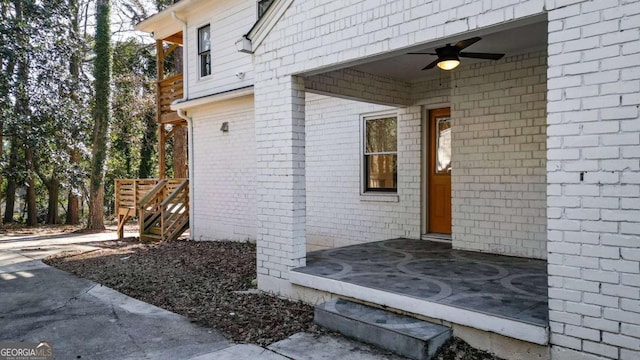 property entrance with ceiling fan