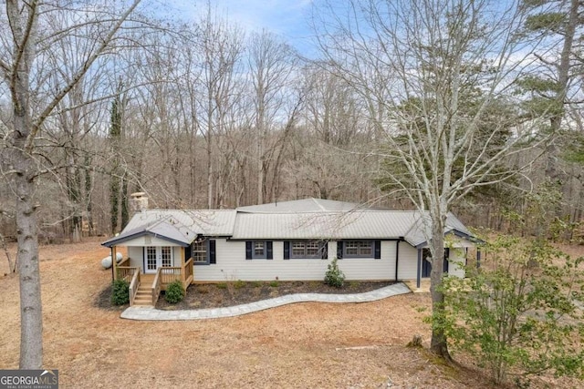 single story home featuring french doors