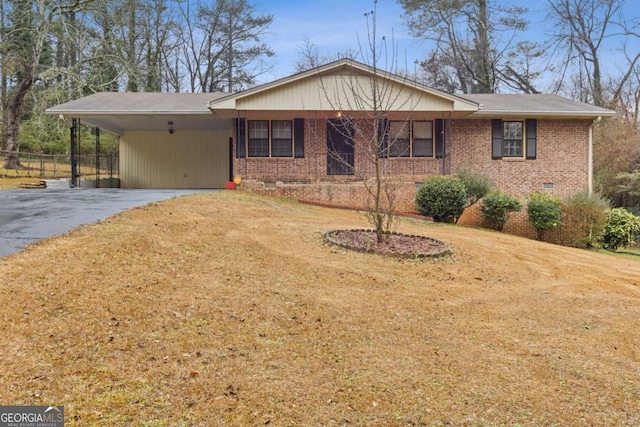 single story home with a carport and a front yard