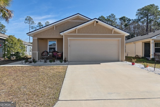 view of front of property with a garage and a porch