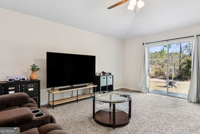 living room with lofted ceiling, carpet floors, and ceiling fan