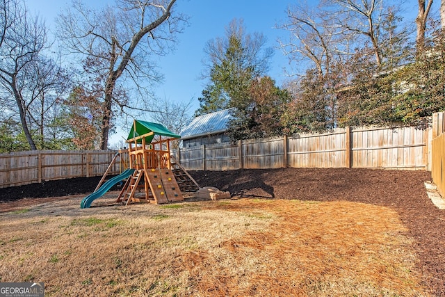 view of yard with a playground