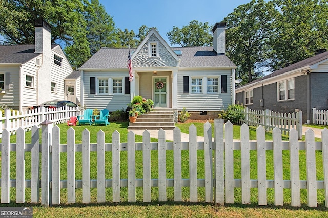 view of front facade featuring a front lawn