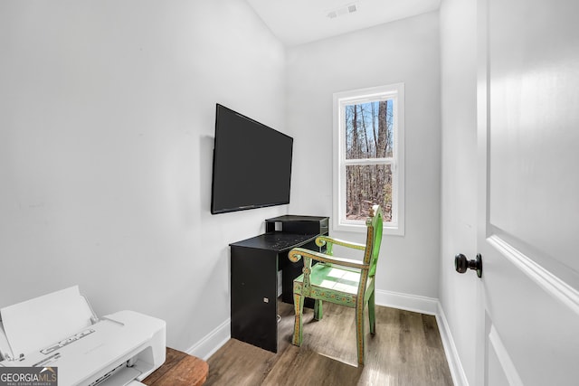 office area featuring dark wood-type flooring