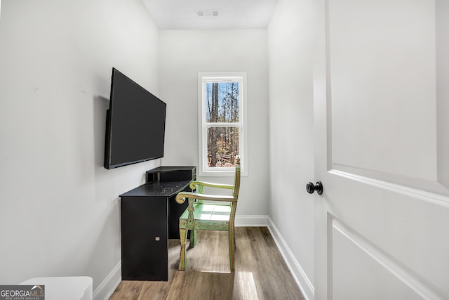 office area with hardwood / wood-style floors