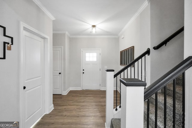 entrance foyer featuring crown molding and hardwood / wood-style floors