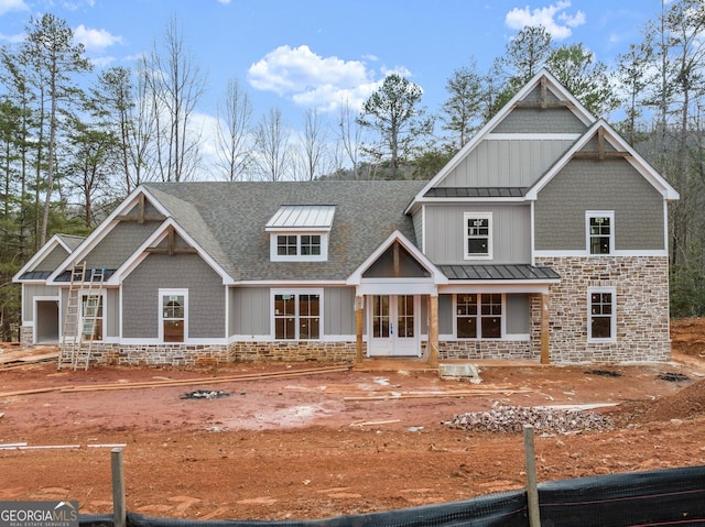 craftsman-style house with french doors