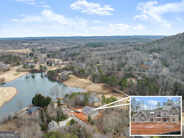 aerial view featuring a water view