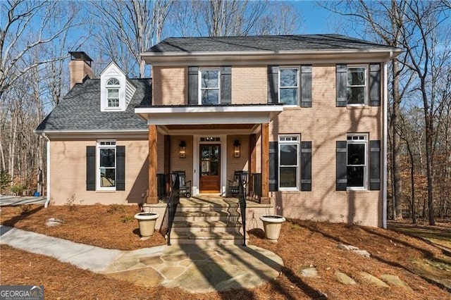 view of front of home featuring covered porch