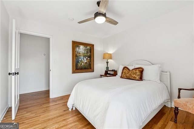 bedroom featuring ceiling fan and light hardwood / wood-style flooring