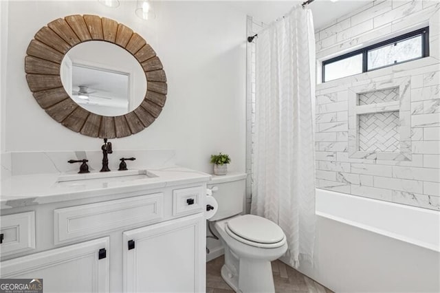 full bathroom featuring vanity, shower / bath combination with curtain, and toilet