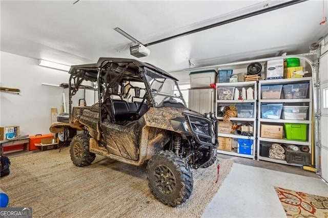 garage featuring a garage door opener