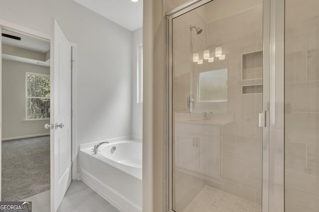 full bathroom with a garden tub and a stall shower