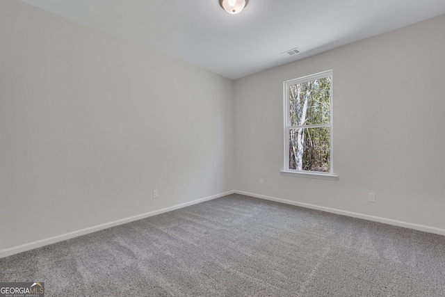 view of carpeted spare room