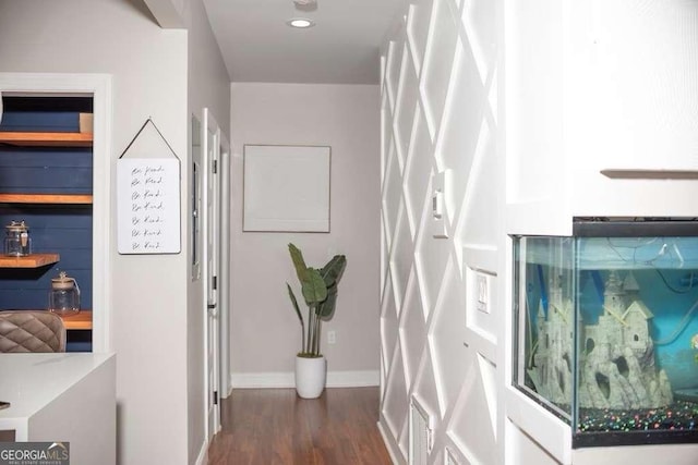 hallway with dark wood-type flooring