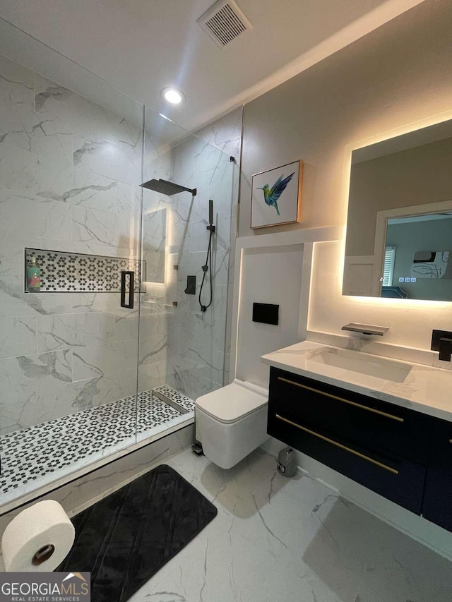 bathroom featuring vanity, an enclosed shower, and toilet