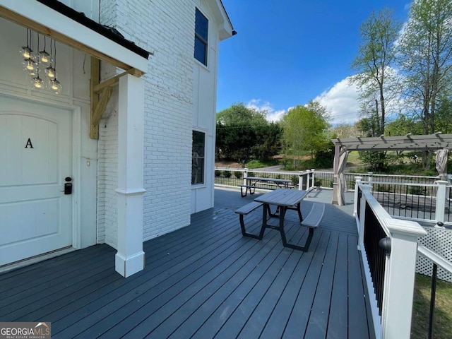 wooden terrace featuring a pergola