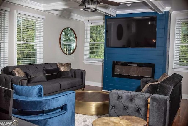 living room featuring a fireplace, beamed ceiling, dark hardwood / wood-style flooring, coffered ceiling, and crown molding