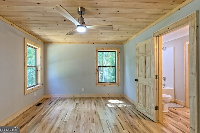 unfurnished room featuring wood ceiling, ceiling fan, and light hardwood / wood-style floors