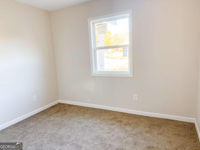 view of carpeted spare room