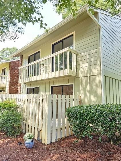 view of property exterior with a balcony