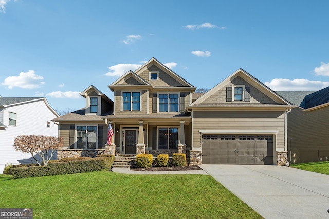 craftsman inspired home featuring a garage, a porch, and a front yard