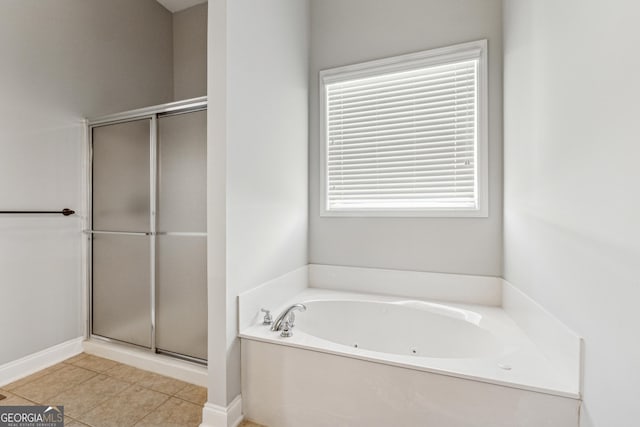 bathroom featuring shower with separate bathtub and tile patterned floors