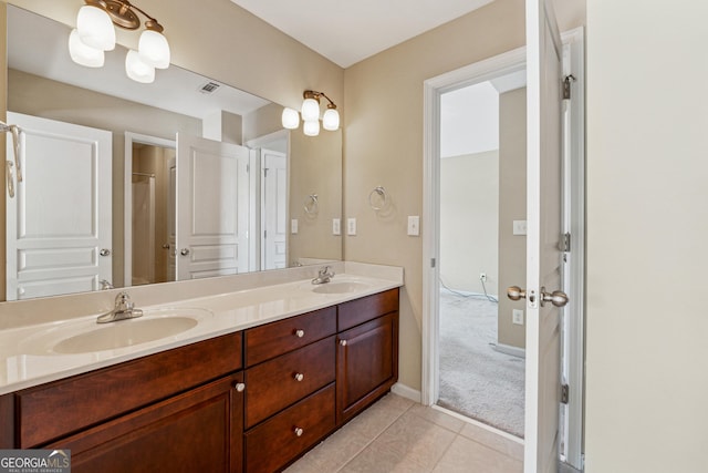 bathroom with vanity and tile patterned floors