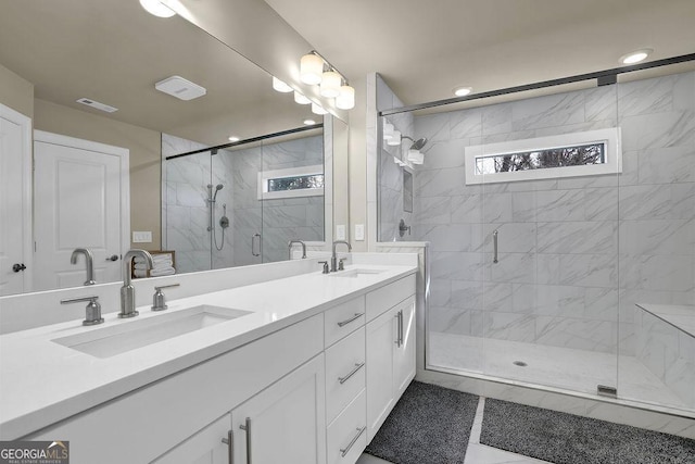 bathroom with vanity and walk in shower