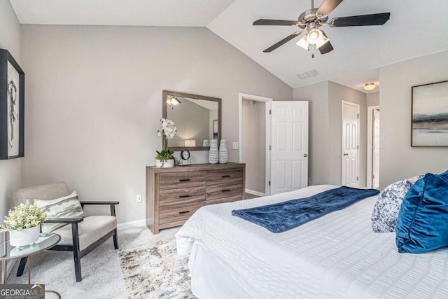 carpeted bedroom featuring vaulted ceiling and ceiling fan