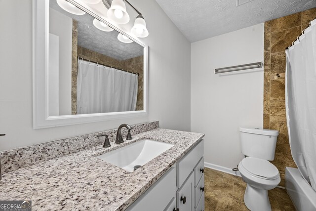 bedroom featuring ceiling fan, a closet, a textured ceiling, and carpet flooring