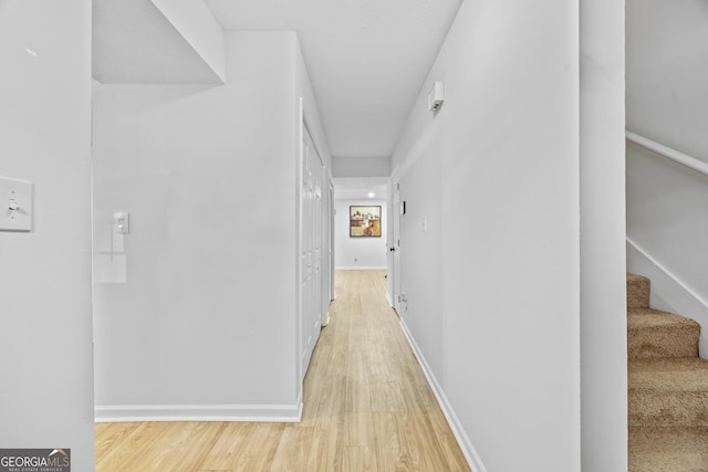 corridor featuring light wood-type flooring