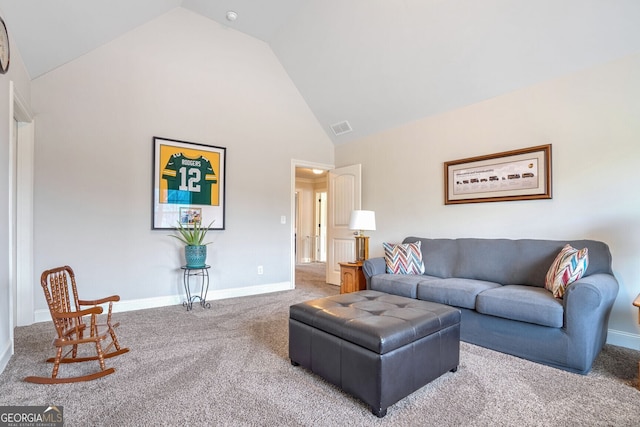 living room with high vaulted ceiling and carpet