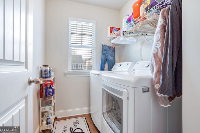 laundry room with independent washer and dryer