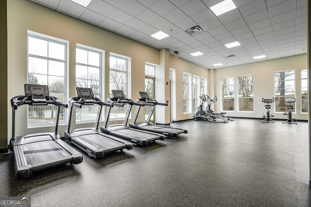 gym with a drop ceiling