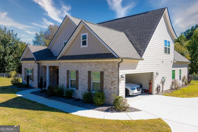 view of front of home featuring a garage and a front yard