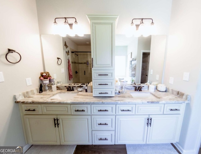 bathroom with vanity and walk in shower