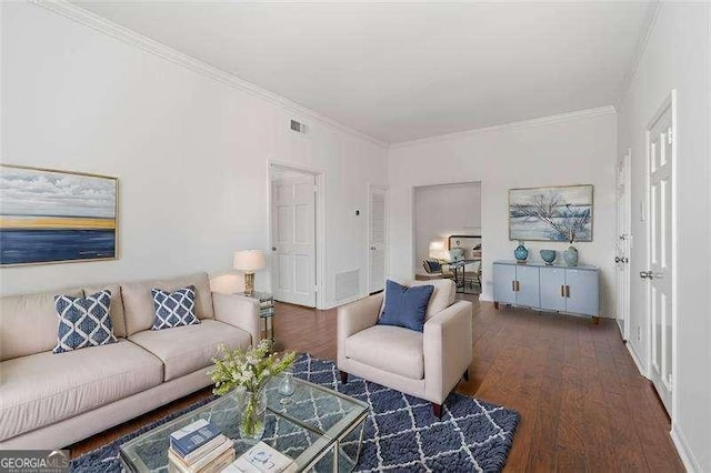 living room featuring ornamental molding and dark hardwood / wood-style floors