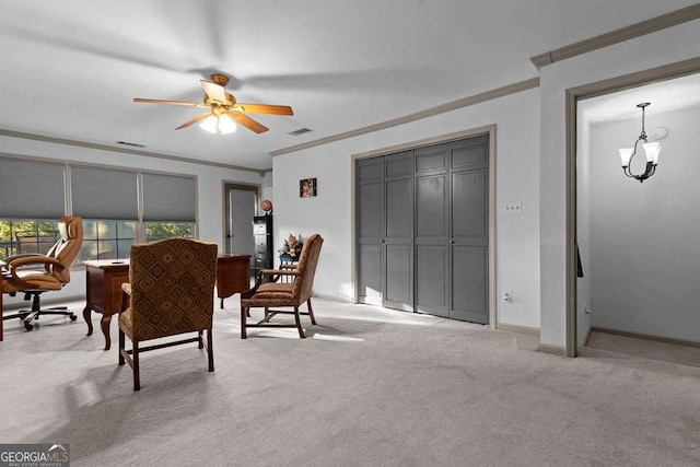 carpeted dining area featuring ornamental molding and ceiling fan