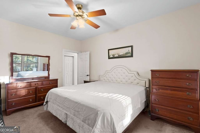 bedroom featuring ceiling fan and carpet flooring