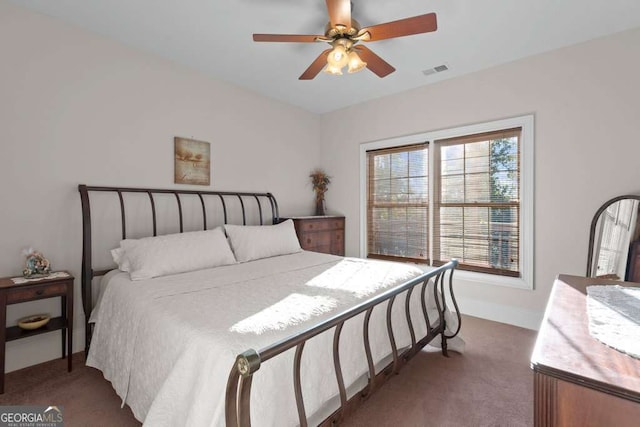 bedroom featuring ceiling fan and carpet floors