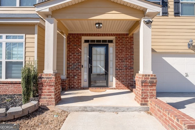 entrance to property featuring a porch