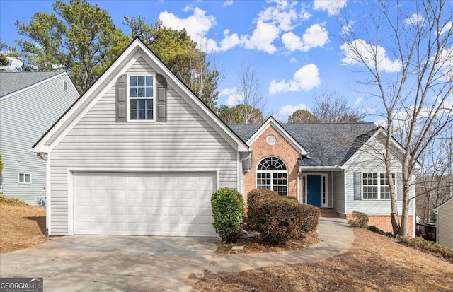 view of front of home with a garage