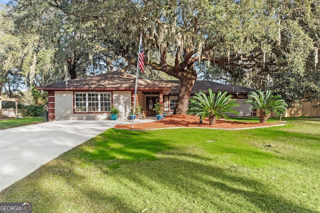 ranch-style house with a front lawn